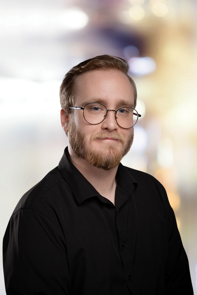Portrait of Troy Newhouse, Help Desk Representative.